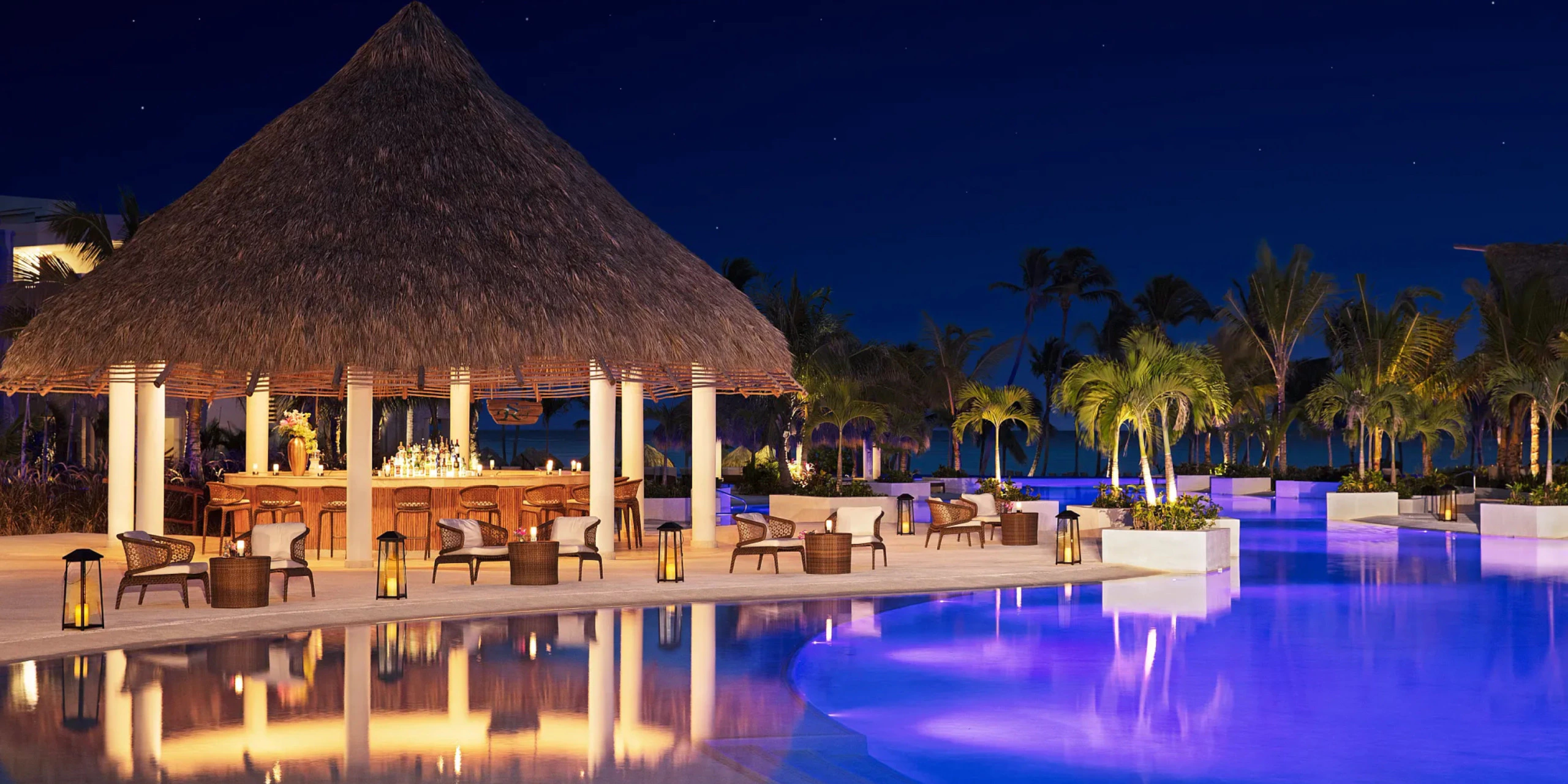 Pool Terrace wedding reception setup overlooking the pool at Secrets Cap Cana Resort & Spa