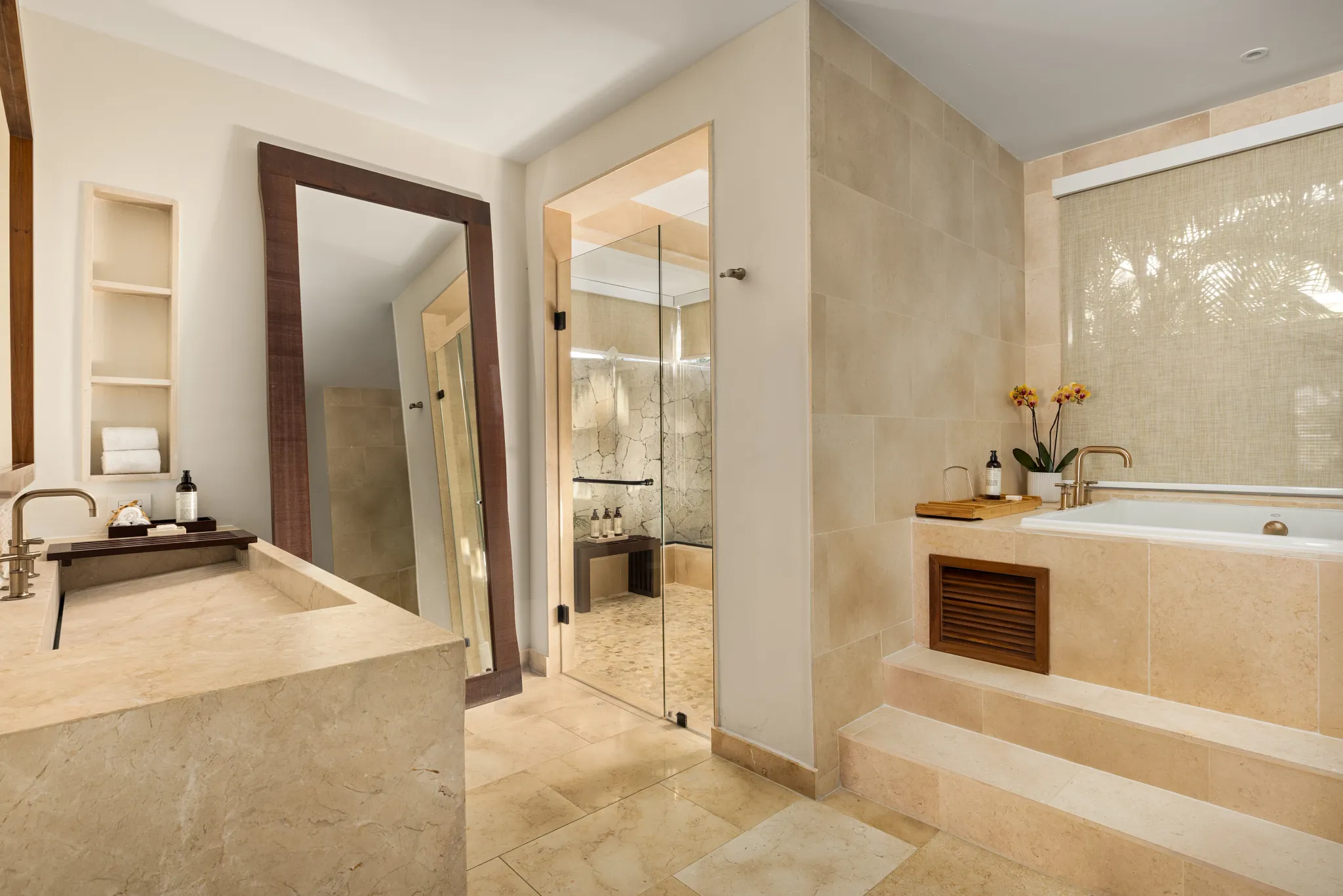 Preferred Club Bungalow Presidential Suite bathroom with soaking tub and walk-in rain shower at Secrets Cap Cana Resort & Spa.